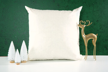 Throw pillow cushion product mockup. Christmas svg craft product mockup with gold reindeer and...