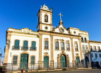 Fototapeta na wymiar Rococo-style facade of a old church created in the 18th century in the Pelourinho district, historic center of Salvador, Bahia