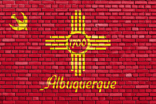 flag of Albuquerque, New Mexico painted on brick wall