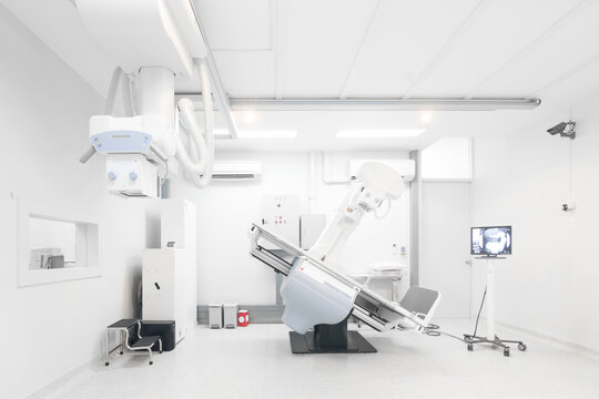 Modern x-ray machine and Computerized Axial Tomography scanning and diagnostic medical equipment in the operating room data center