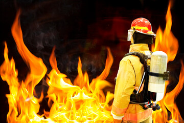 Firefighter in mask and airpack full protective suitprepared rescued the victims from the fire
