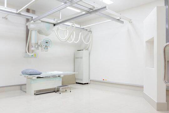 Modern x-ray machine and computerized axial tomography scanning and medical equipment in the operating room data center of modern hospital