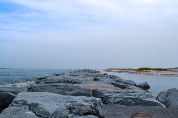 Fototapeta na wymiar rock ocean barrier and tide pools