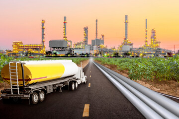 Tanker truck and oil pipeline for transport fuel on the highway to petrochemical oil refinery in...