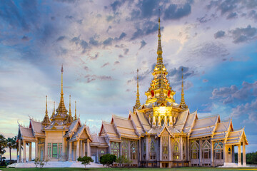 Beautiful thai temple against sunset sky in thailand country