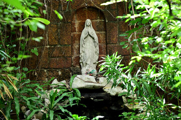 Close up of Statue of Our lady of grace virgin Mary in the church, Thailand with natural background.