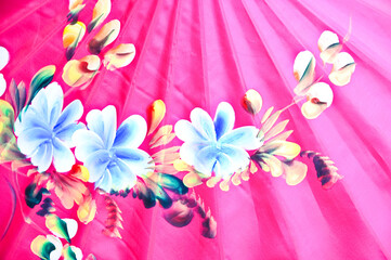  Paper umbrella with a flower pattern in bright colors