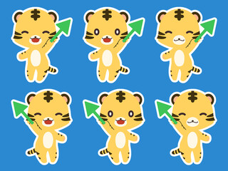 白いフチのついた笑顔で矢印を持っているトラのイラストのセット