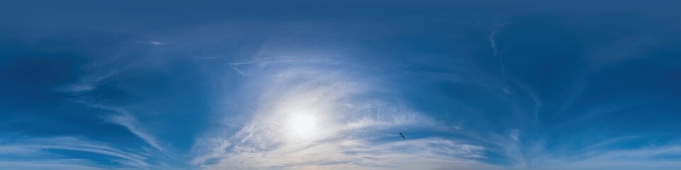 Blue sky panorama with Cirrus clouds. Seamless hdr 360 degree pano in spherical equirectangular format. Complete zenith for 3D visualization, game and sky replacement for aerial drone 360 panoramas.