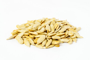A pile of peeled sunflower seeds isolated on white background. Close-up of sunflower seeds isolated.