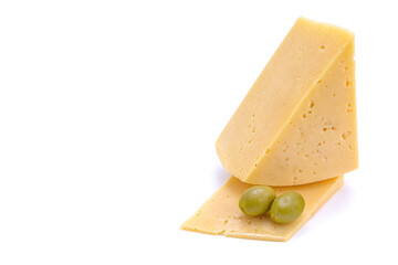 A piece of hard yellow gouda cheese with olives close-up, isolated on a white background.selective focus