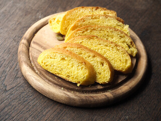 Sliced yellow pumpkin bread