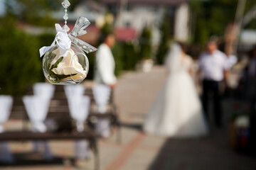 roses in glass balls in festive and wedding decor