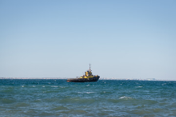Ship in the sea water background.