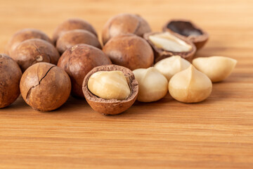 Macadamia nuts on wooden table