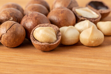 Macadamia nuts on wooden table