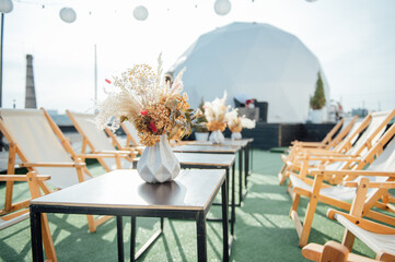 view of cozy cafe outdoors on the roof