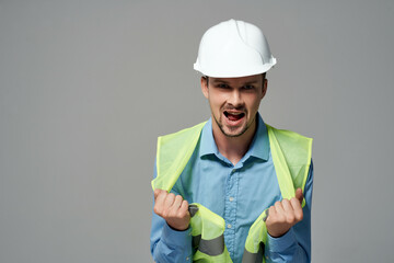 man reflective vest blueprints builder isolated background