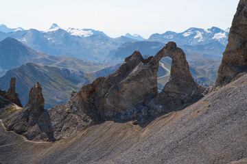 Mountain landscape with a rock arch in summer in the French Alps à Tignes
