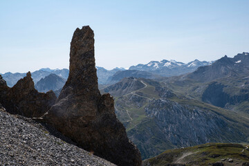 Fototapeta na wymiar Mountain landscape with a rock arch in summer in the French Alps à Tignes 
