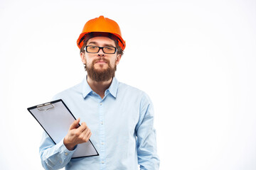 bearded man documents in hand and drawings Studio hand gesture