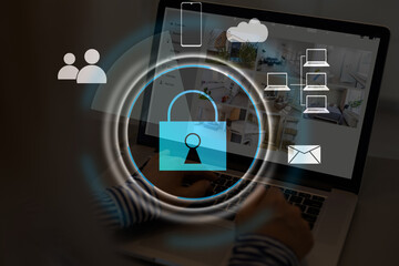 Person using a laptop computer with technology cybersecurity and privacy concept. protection and safe data for global network security