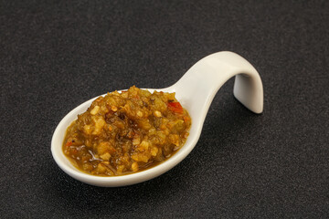 Green spicy sauce in the bowl