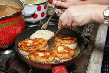Traditional home Russian cuisine - fried in oil pies with potatoes