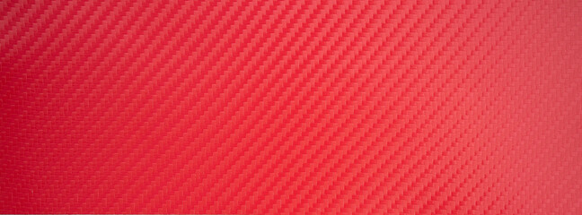 Red carbon fiber texture of rectangular shape. Vinyl carbon film.