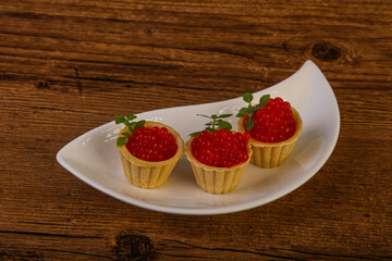 Apetizer - tartlet with red caviar
