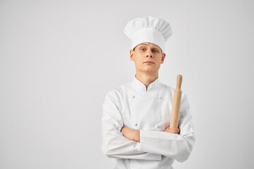 chef with a hat on his head kitchen utensils work in the kitchen