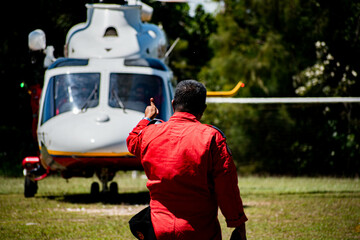 Obraz premium Rappelling and Helicopter maneuvers by the fire department.