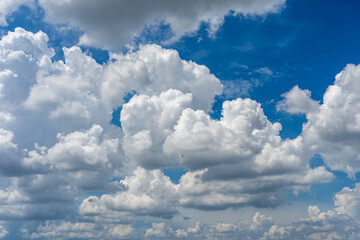 Beautiful cloudy sky background with white clouds floating