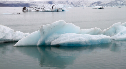 Jokulsarlon Glacier Lagoon in Iceland with icebergs and clear water