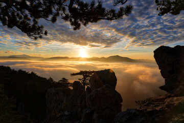 Sunset over fog in the mountains