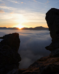 Sunset over fog in the mountains