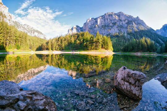 Calm lake in the alps in the morning