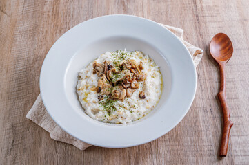 Mushroom risotto in a white bowl