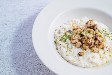 Mushroom risotto in a white bowl