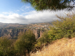 Fototapeta premium Village and mountain view. Summertime