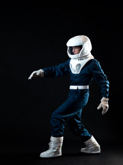 An astronaut walks in low-gravity conditions. The hero