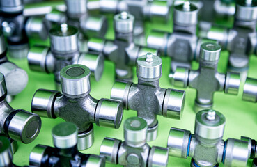 Plumbing and fittings on a green background.