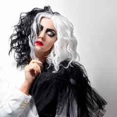charismatic unusual woman in a black and white outfit with black and white hair,
