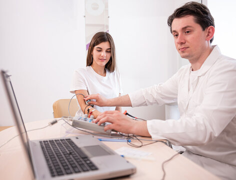 Patient Nerves Testing Using Electromyography At Medical Center