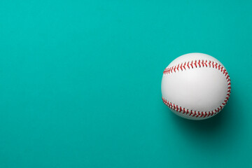 baseball on green background, top view sport concept