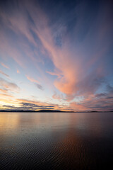 The view of the Bottenhavet inlet in Sweden. Made with setting sun towards the island Sodra Ulvon.
