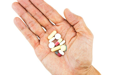 Pills on hand on white background with clipping path