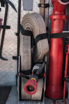 bunch of fire hoses on a firetruck. Rescue fire truck equipment.
