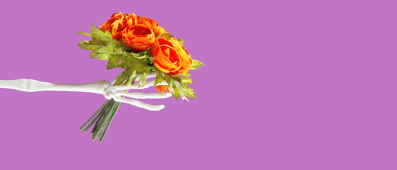 Halloween present from skeletal hand. Bizarre concept.