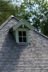 attic window with beautiful woodwork, old